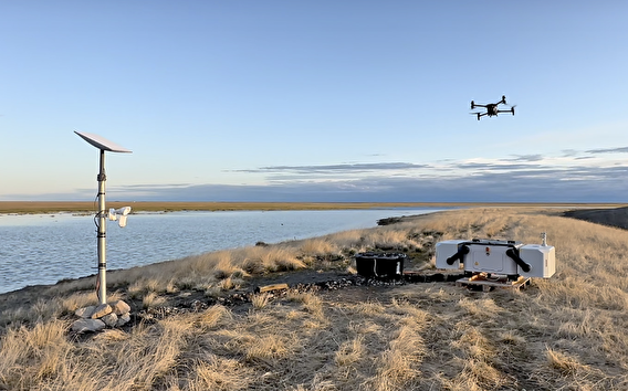 UAS drone flying over barren landscape